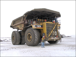 Illustration for article titled Meet Your New Robot Overlord: The Autonomous Mining Truck